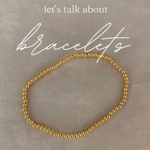Gold beaded stretch bracelet.